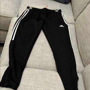 Adidas small, could fit women, or older children male or female
